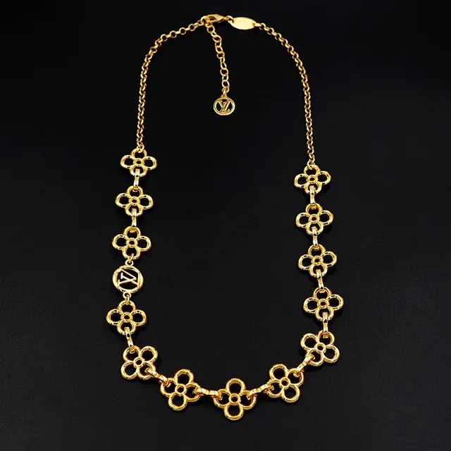 Louis Vuitton Gold Floral Quatrefoil Links Interlocking LV Monogram Medallions Necklace 6
