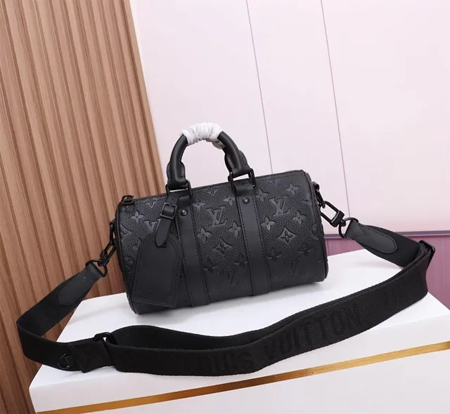 Louis Vuitton Keepall Bandoulière 25 Black Embossed Monogram Cylindrical Duffle Bag 2