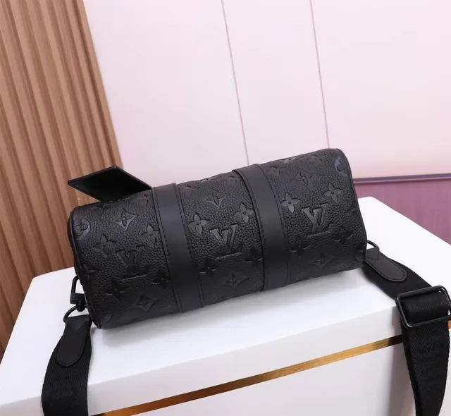 Louis Vuitton Keepall Bandoulière 25 Black Embossed Monogram Cylindrical Duffle Bag 3