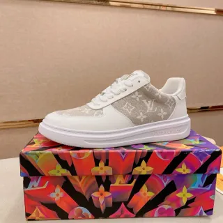 Louis Vuitton LV Trainer Blancas Beige Monograma Lona Panel Cuero Superposiciones Estilo Zapatillas