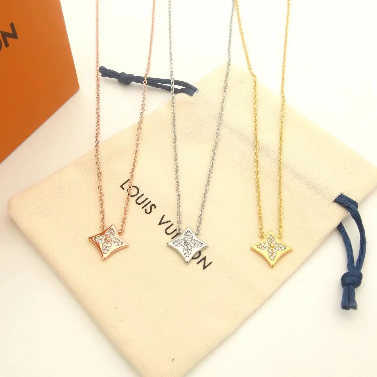 Louis Vuitton Monogram Flower and LV Star Pavé Pendant Necklaces 8
