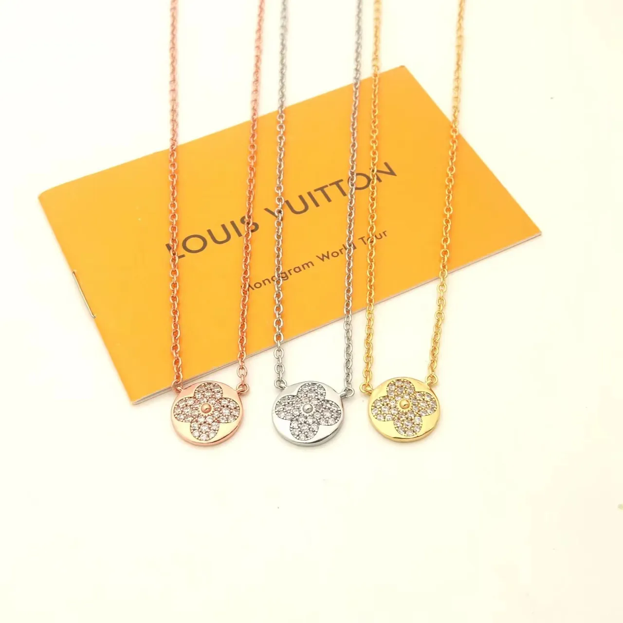 Louis Vuitton Monogram Flower and LV Star Pavé Pendant Necklaces 9