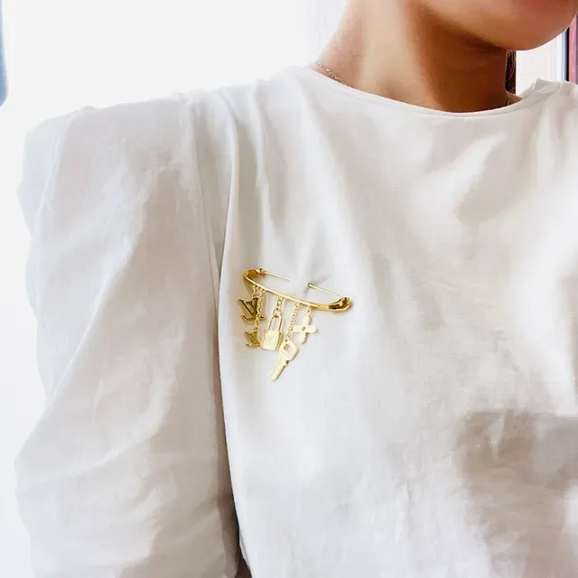 Louis Vuitton Monogram Icons Gold-Tone Safety Pin Brooch 9
