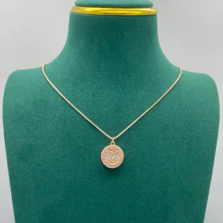 Louis Vuitton Monogram Medallion Gold-Tone Circular Pendant Necklace