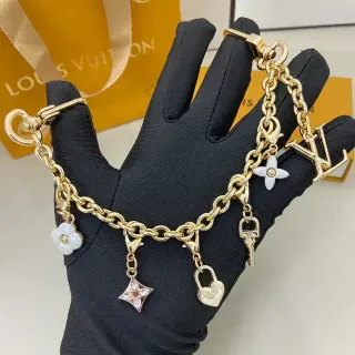 إسورة Louis Vuitton Multi-Charm سلسلة كيرب ذهبية وبيضاء تصميم القلادة
