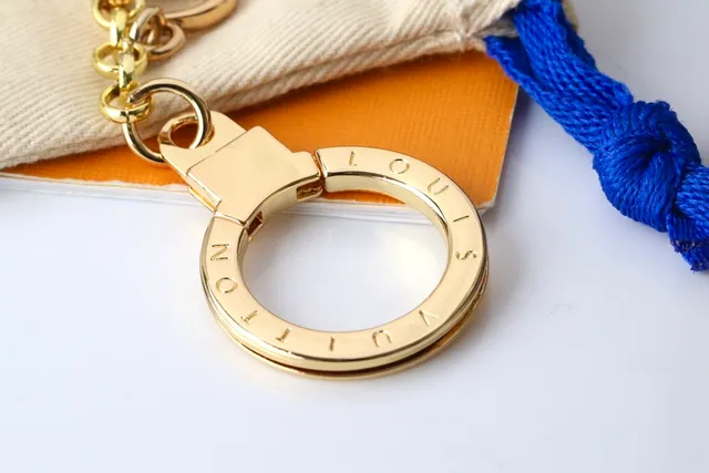 Louis Vuitton Multi-Charms Keychain Gold Metal Pendant Bracelet 2