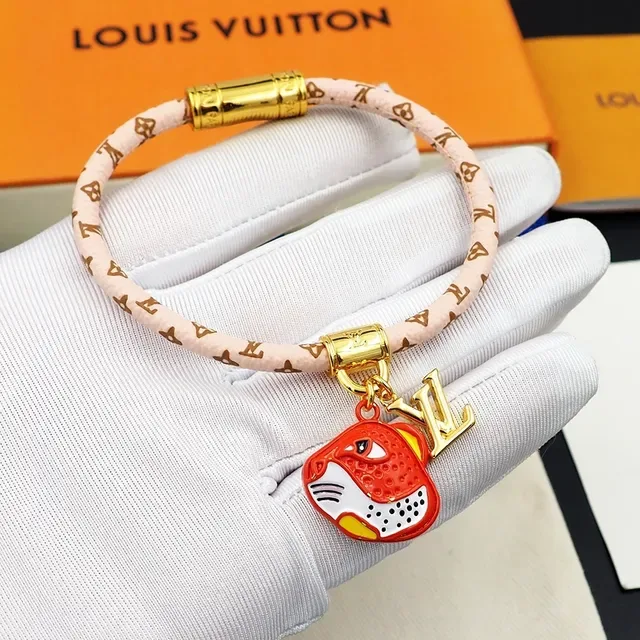 Louis Vuitton Pink Gold Woven Monogram Band Enamel Tiger Charm Bracelet 3