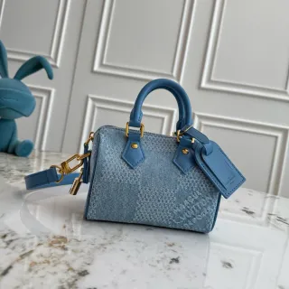 Louis Vuitton Silueta de Barril Estructurada Texturizada en Denim Monograma Jacquard Bolsa Boston