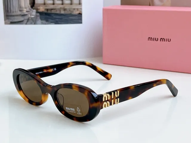 Miu Miu Wander Black Oval Acetate Sunglasses 8