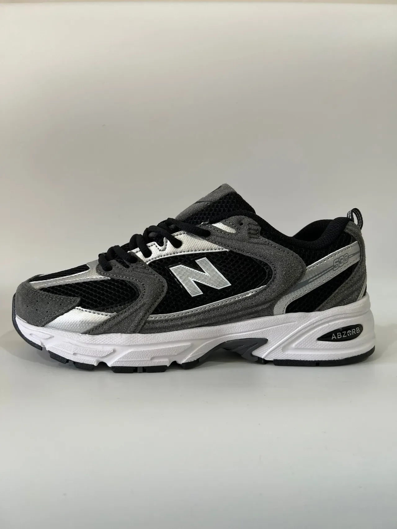 New Balance 530 Noir Gris Argent Sneakers lifestyle 6