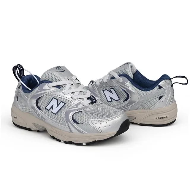 New Balance Chaussures lifestyle noires et blanches avec midsole chunky, empeigne hybride mesh-synthetique 9