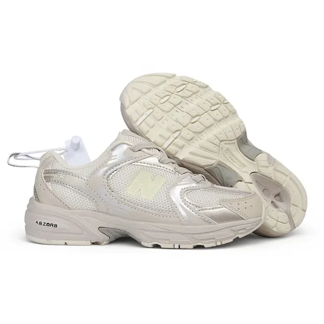 New Balance Chaussures lifestyle noires et blanches avec midsole chunky, empeigne hybride mesh-synthetique 18