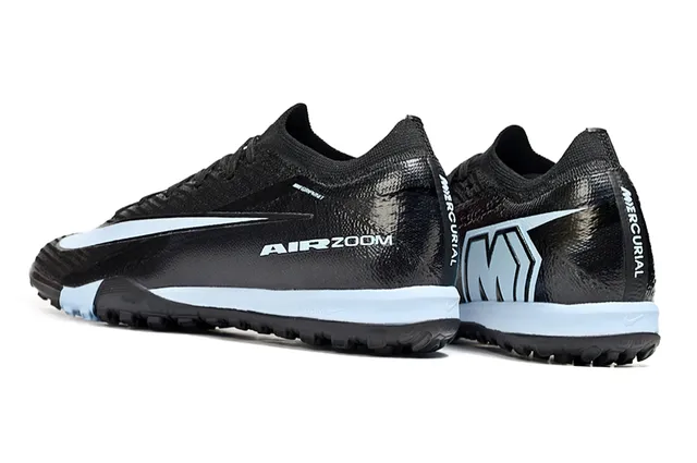 Nike Chaussures de football turf noir et bleu avec tige en tricot et lacets intégrés 4