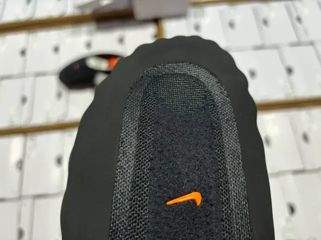 Nike Black Orange Slip-On Sculpted Wavy Midsole Sneakers 6
