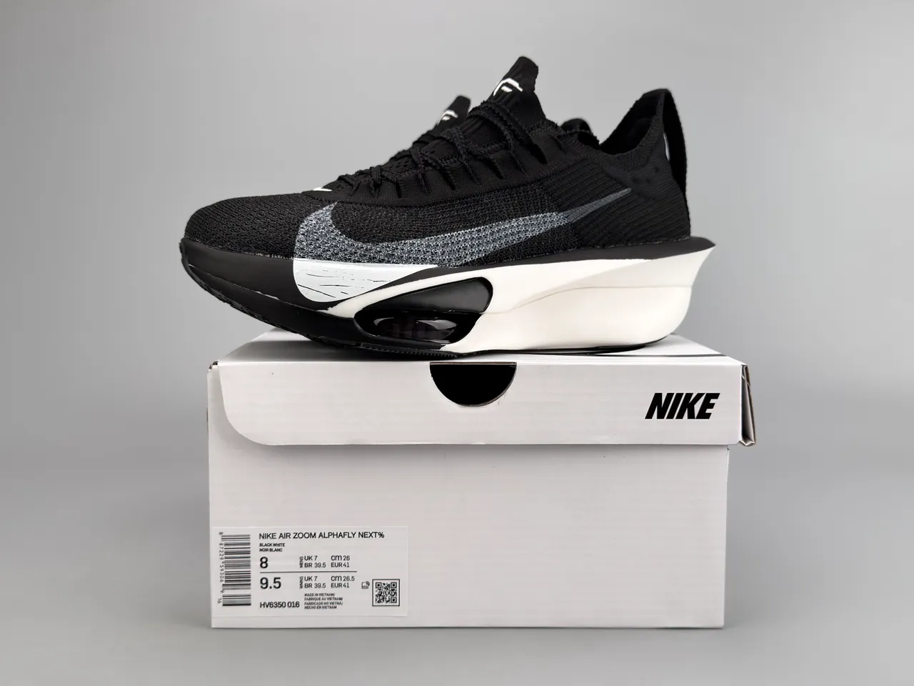 Nike Black White Knit Upper Asymmetrical Midsole Running Shoes 2