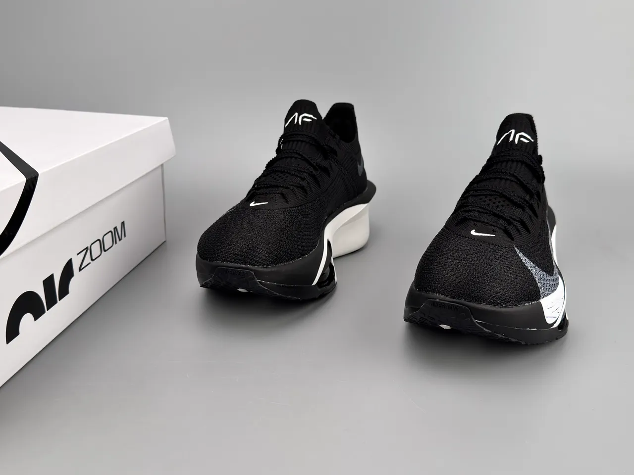 Nike Black White Knit Upper Asymmetrical Midsole Running Shoes 3