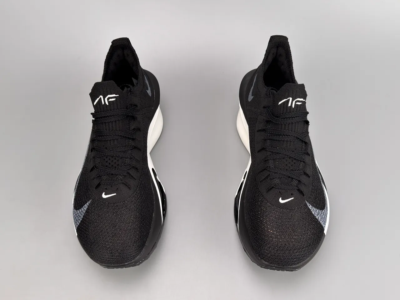 Nike Black White Knit Upper Asymmetrical Midsole Running Shoes 7