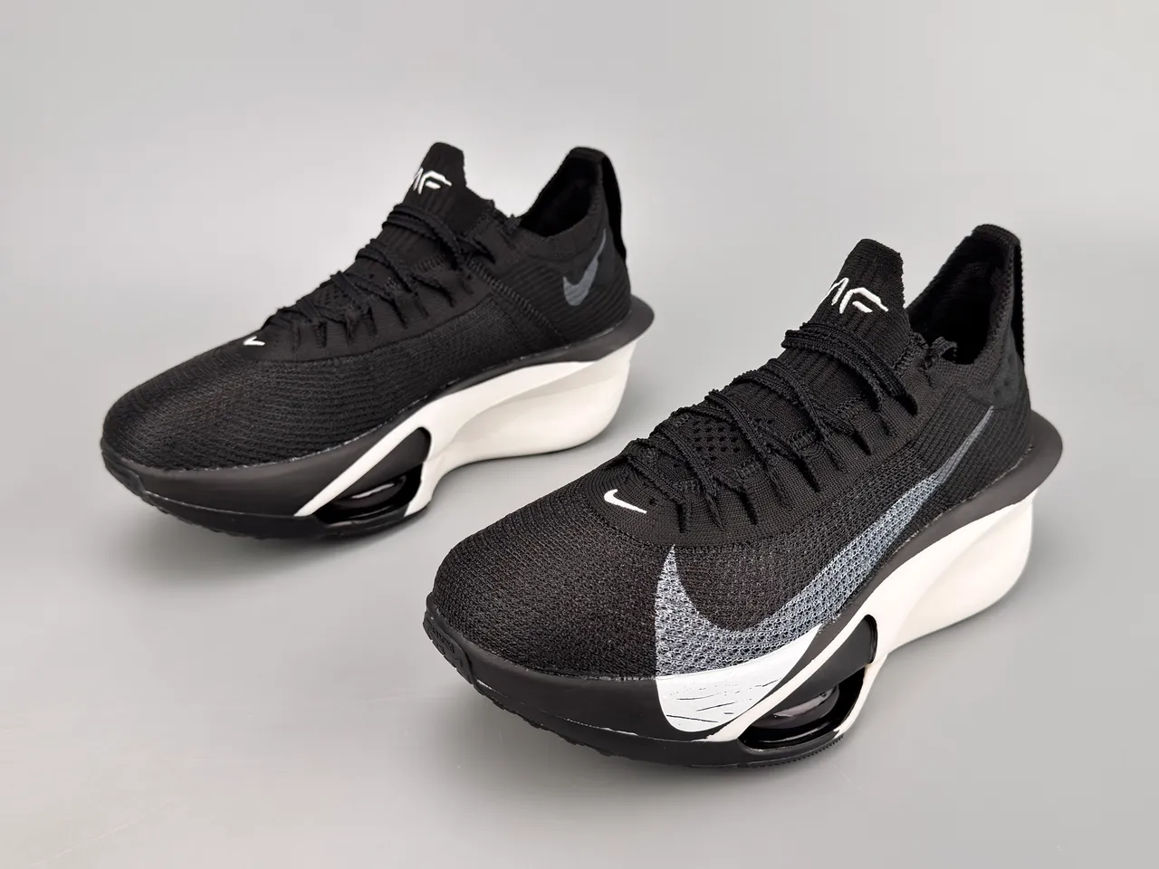 Nike Black White Knit Upper Asymmetrical Midsole Running Shoes 9