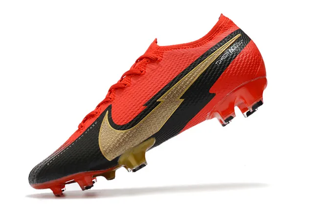 Nike Chaussures de football multicolor à coupe basse avec upper à impression graphique pour terrain ferme 14