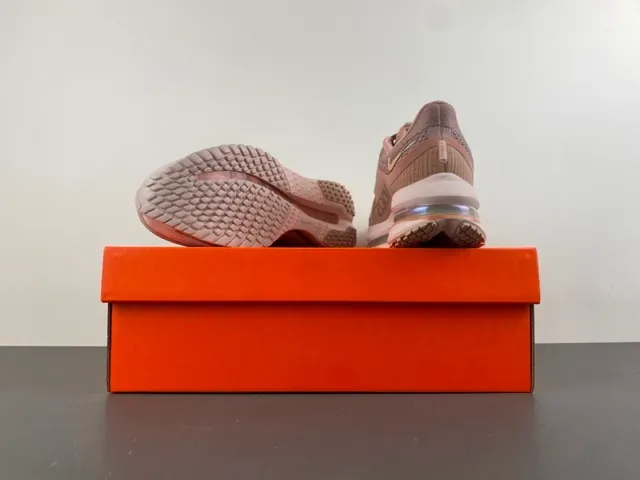 Nike Chaussures de running rose beige avec upper de knit visible Air Zoom Unit 16