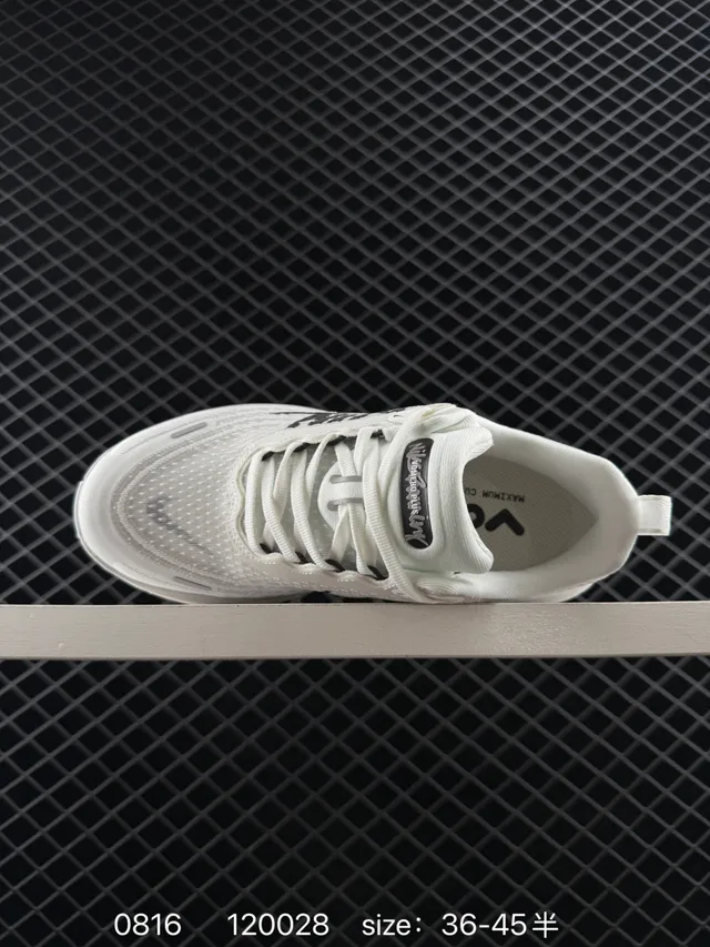 Nike VOMERO PLUS Zapatos de correr blancos y negros ZoomX 4
