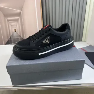 Prada Cloudbust কালো মেশ এবং চামড়ার প্ল্যাটফর্ম লাইফস্টাইল স্নিকার