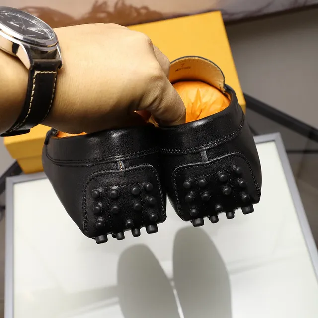Tod's H-Buckle Mocassim de couro preto e branco com alça 2