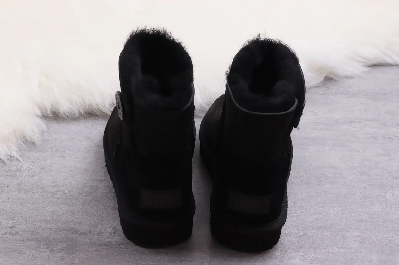 UGG Classic Short Black Shearling-Lined Snow Boots 13