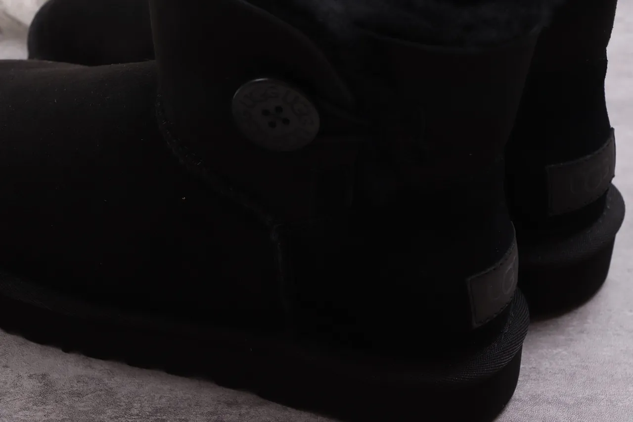 UGG Classic Short Black Shearling-Lined Snow Boots 14