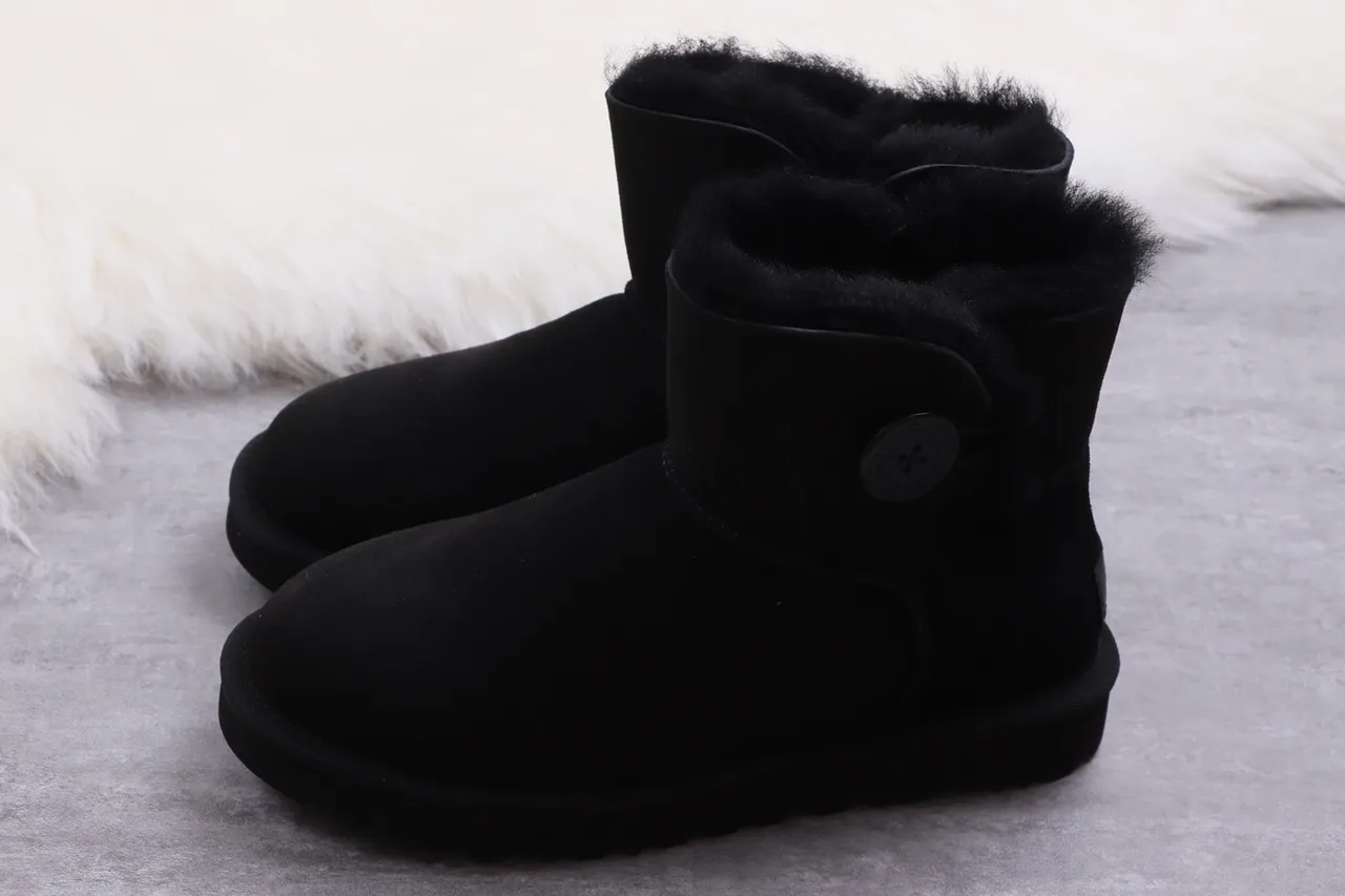 UGG Classic Short Black Shearling-Lined Snow Boots 15