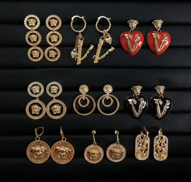 Versace Brincos Medusa e Greca Motif Cristal Dourado 4