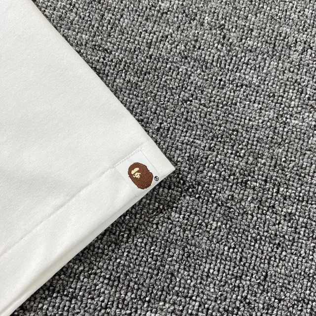 A Bathing Ape Arch Logo White Graphic T-Shirt 6