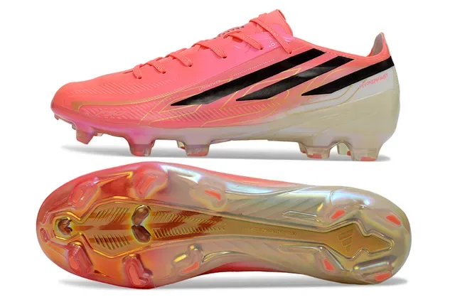 Adidas Chaussures de football rose noir de profil bas focus sur la vitesse pour terrain ferme 6