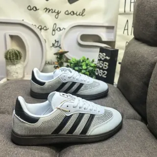 Adidas सफेद काला छिद्रित जाली ऊपरी तीन धारियाँ लाइफस्टाइल स्नीकर