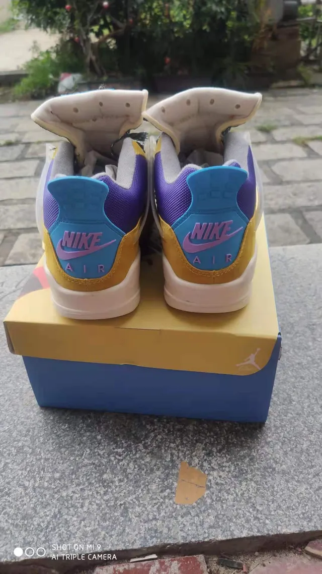 Chaussures de basketball Air Jordan 4 Retro jaune violet cyan 5