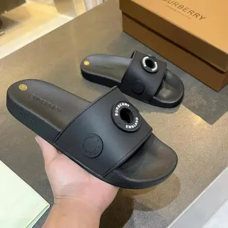 Burberry Black Gold Molded Rubber Branded Circular Buckle Slippers