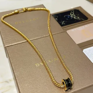 Bvlgari B.zero1 सोना काला बुना हुआ गेहूं लिंक चेन बैरल शेप पेंडेंट नेकलेस