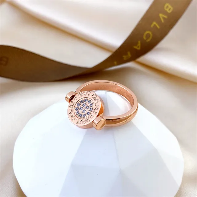 Bvlgari B.zero1 ঘূর্ণনীয় বেজেল সোনা এবং কালো রিং 5