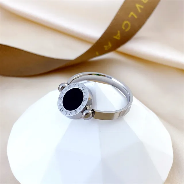 Bvlgari B.zero1 ঘূর্ণনীয় বেজেল সোনা এবং কালো রিং 6