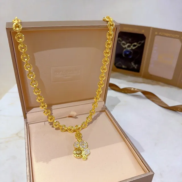 Bvlgari Chaîne en maillons de corde texturée en or et argent pendentif circulaire de style pièce de monnaie en cascade 2