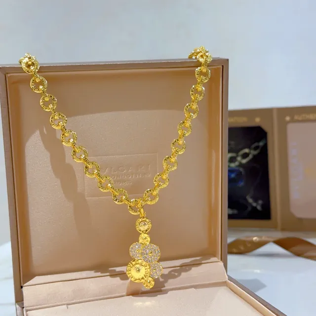 Bvlgari Chaîne en maillons de corde texturée en or et argent pendentif circulaire de style pièce de monnaie en cascade 6