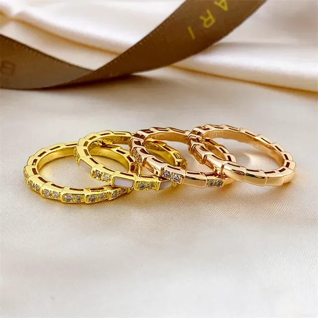 Bvlgari Tubogas সোনালি মাদার অফ পার্ল এবং পেভ স্টোন আংটি 2
