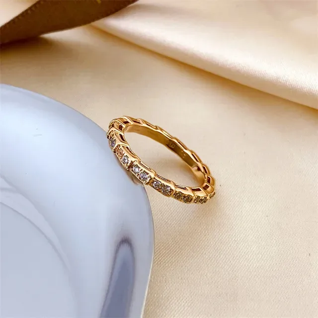 Bvlgari Tubogas সোনালি মাদার অফ পার্ল এবং পেভ স্টোন আংটি 7