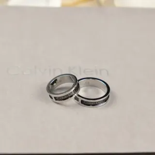Calvin Klein Engraved Silver-Tone and Black Inlay Rings