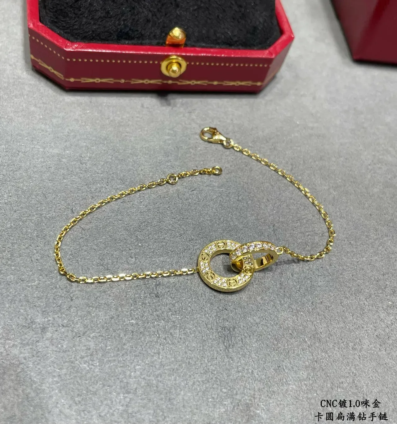 Cartier Bracelet or et argent motif double cercle entrelacé pavé pierres transparentes 6