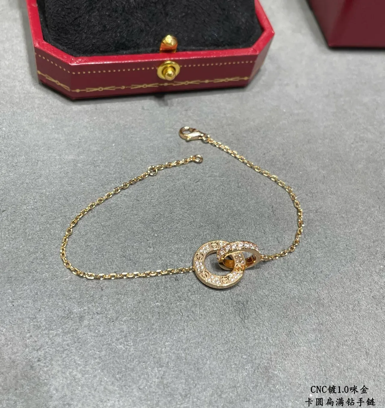 Cartier Bracelet or et argent motif double cercle entrelacé pavé pierres transparentes 7