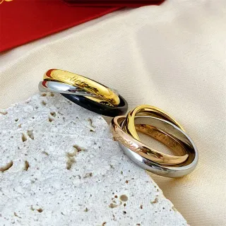 Anillo Cartier Trinity de oro y plata con bandas entrelazadas triple-banda de metal pulido