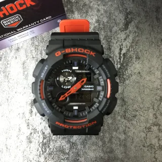 Casio G-Shock GA-100 কালো এবং কমলা স্পোর্টস ওয়াচ