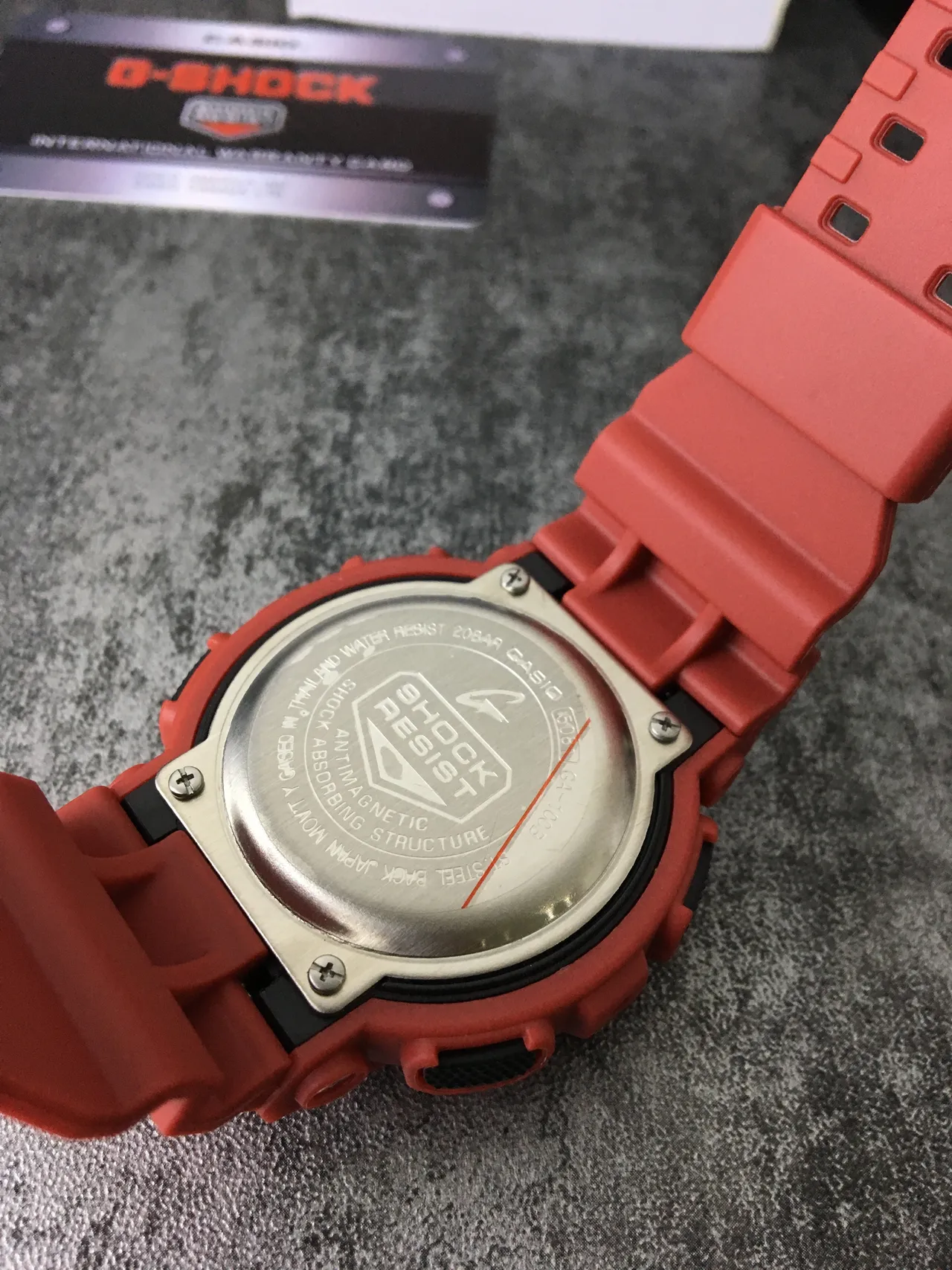 Casio G-Shock GA-100 ساعة رياضية برتقالية من الراتنج 3