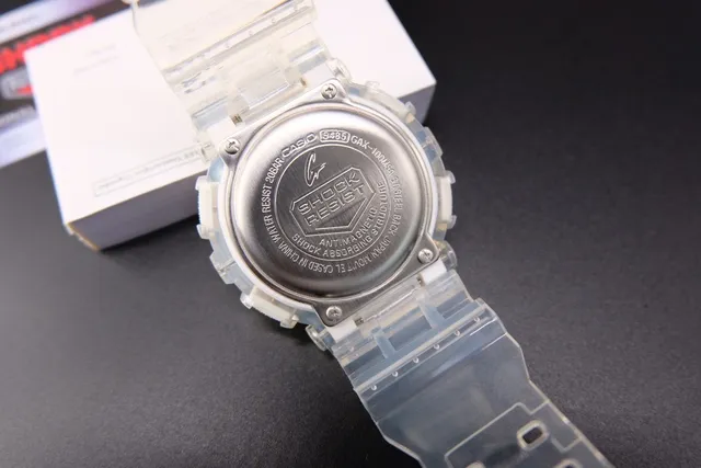 Casio G-Shock GA-100 Montre Sport en Résine Translucide 4